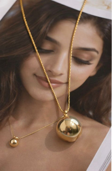 Golden Orbit Pendant Necklace