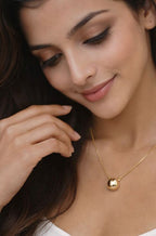 Golden Orbit Pendant Necklace